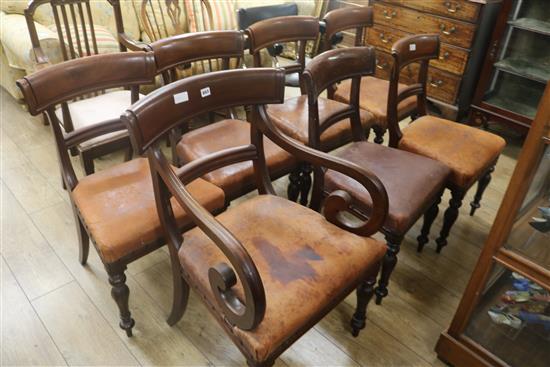 A set of seven early Victorian leather seat dining chairs